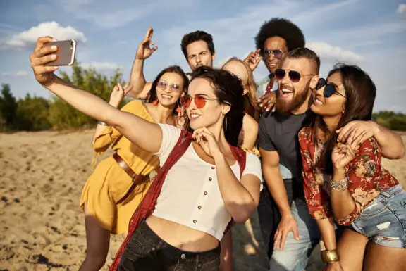 group-friends-taking-selfie-beach 1